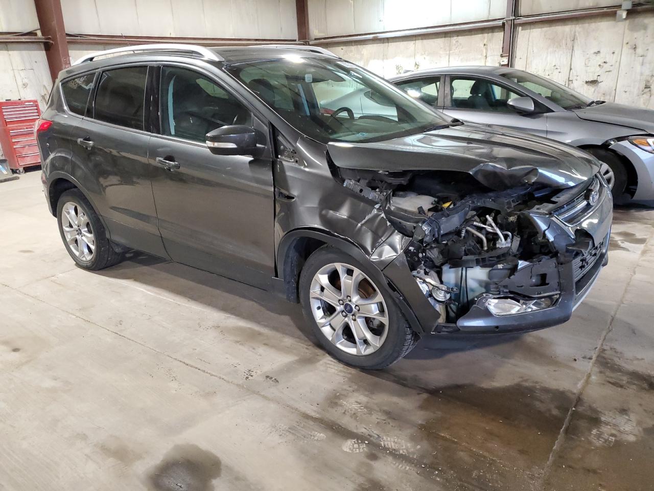 2015 Ford Escape VIN 1FMCU0JX8FUB16993 Copart auction photo, front end / minor dent/scratches damage thumbnail 4