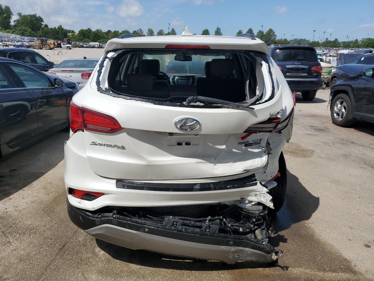 2018 Hyundai Santa Fe VIN 5XYZWDLA4JG513202 Copart auction photo, rear end damage thumbnail 6