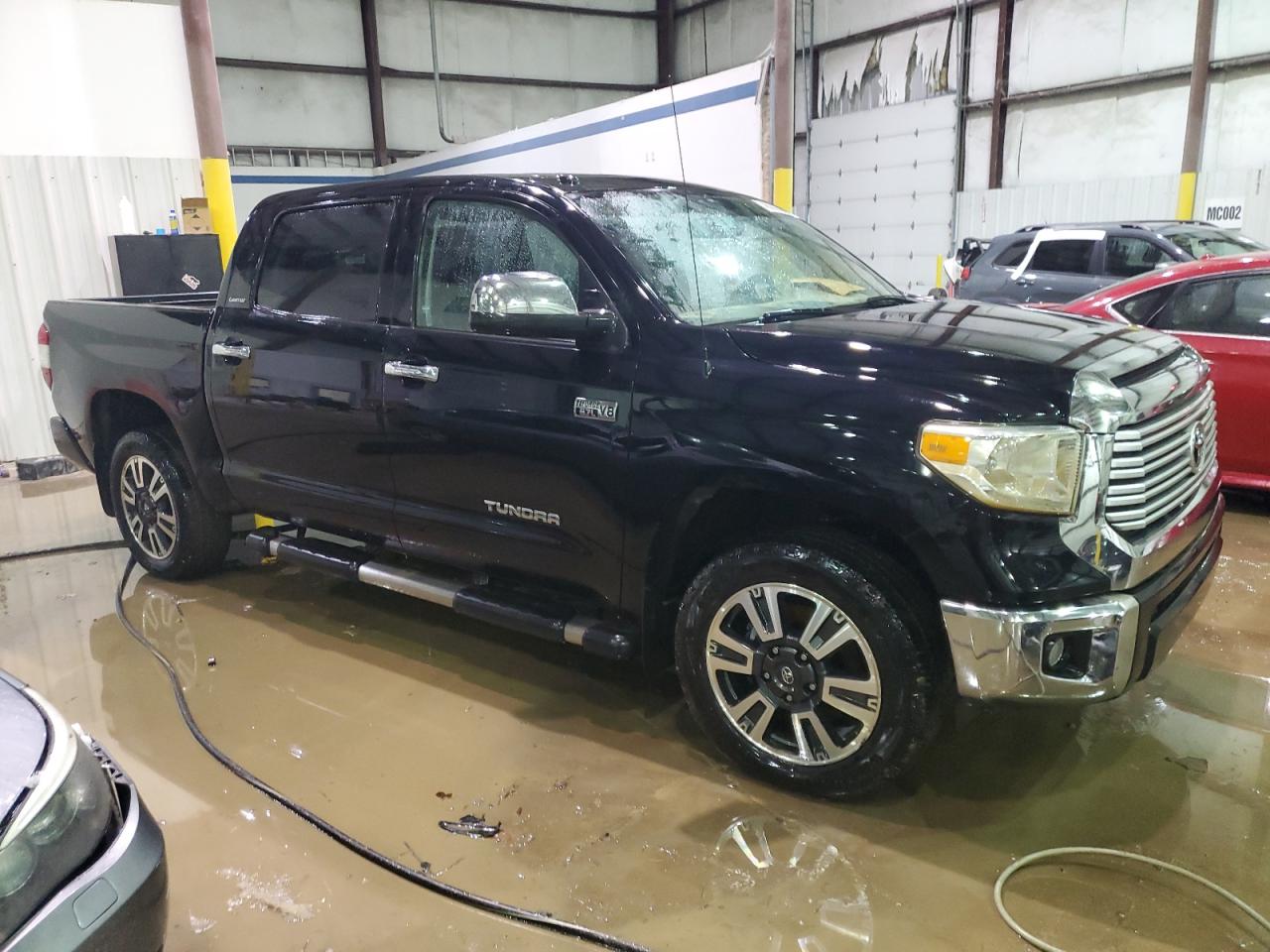 2017 Toyota Tundra VIN 5TFHW5F16HX604119 Copart auction photo, water/flood damage thumbnail 4