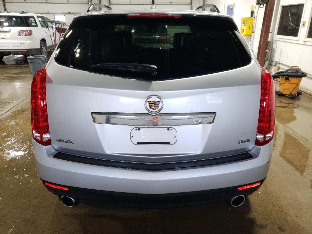 2012 Cadillac SRX VIN 3GYFNGE35CS585317 Copart auction photo, mechanical / minor dent/scratches damage thumbnail 6