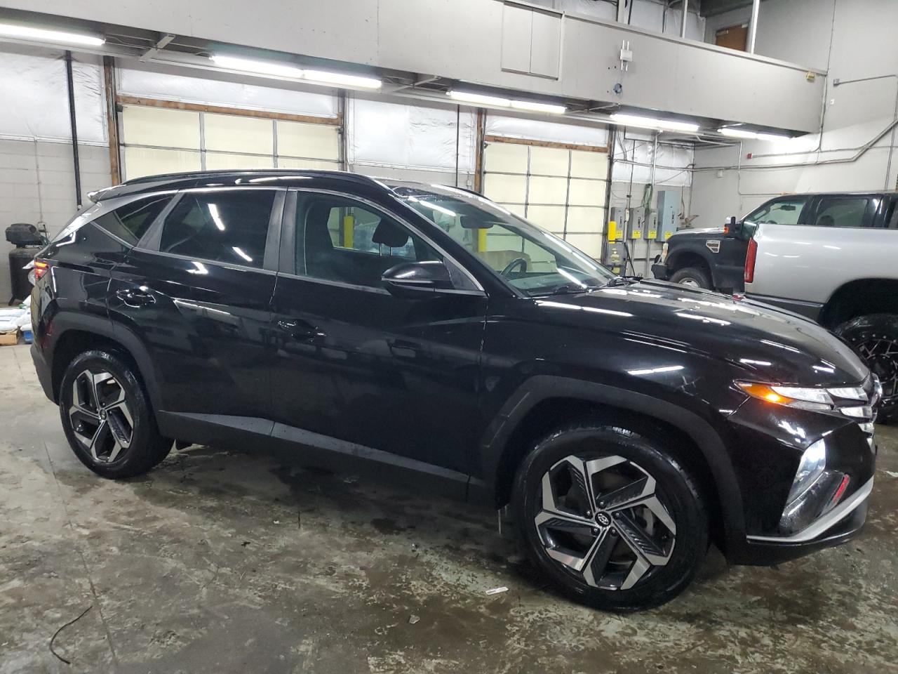 2022 Hyundai Tucson VIN 5NMJFCAE6NH040931 Copart auction photo, hail damage thumbnail 4