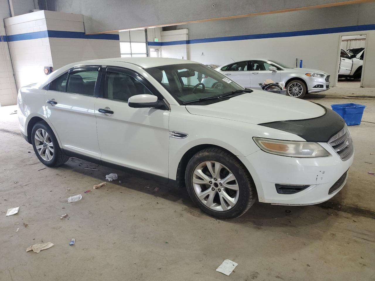 2010 Ford Taurus VIN 1FAHP2EW6AG124263 Copart auction photo, top/roof damage thumbnail 4
