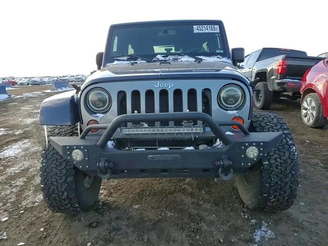 2013 Jeep Wrangler VIN 1C4BJWDG4DL586397 Copart auction photo, rear end / side damage thumbnail 12