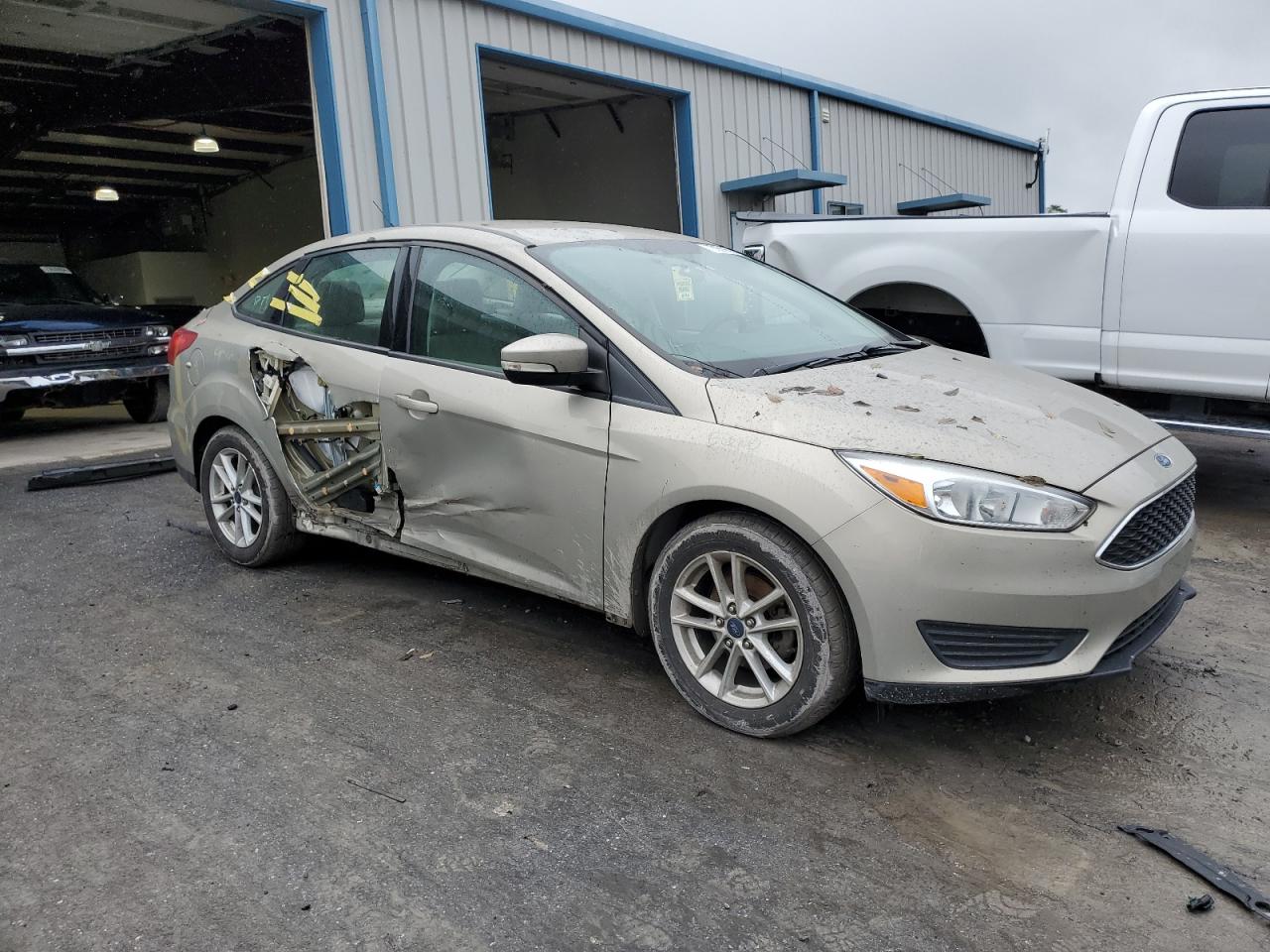 2015 Ford Focus VIN 1FADP3F20FL298764 Copart auction photo, side damage thumbnail 4
