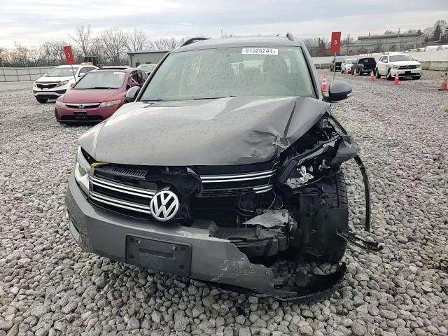 2015 Volkswagen Tiguan VIN WVGBV7AX7FW615015 Copart auction photo, front end / side damage thumbnail 12
