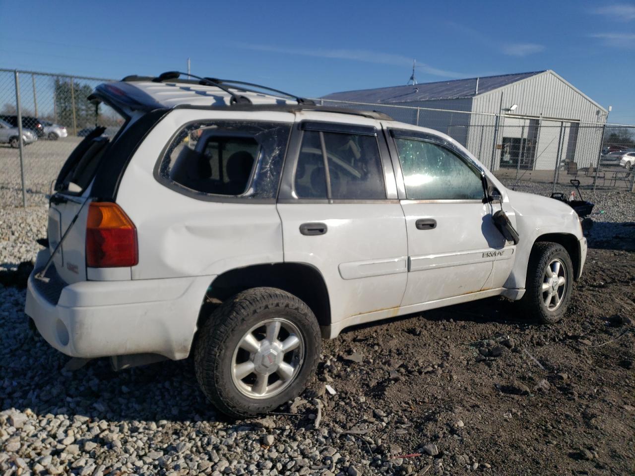 2005 GMC Envoy VIN 1GKDT13S252344795 Copart auction photo, top/roof / all over damage thumbnail 3