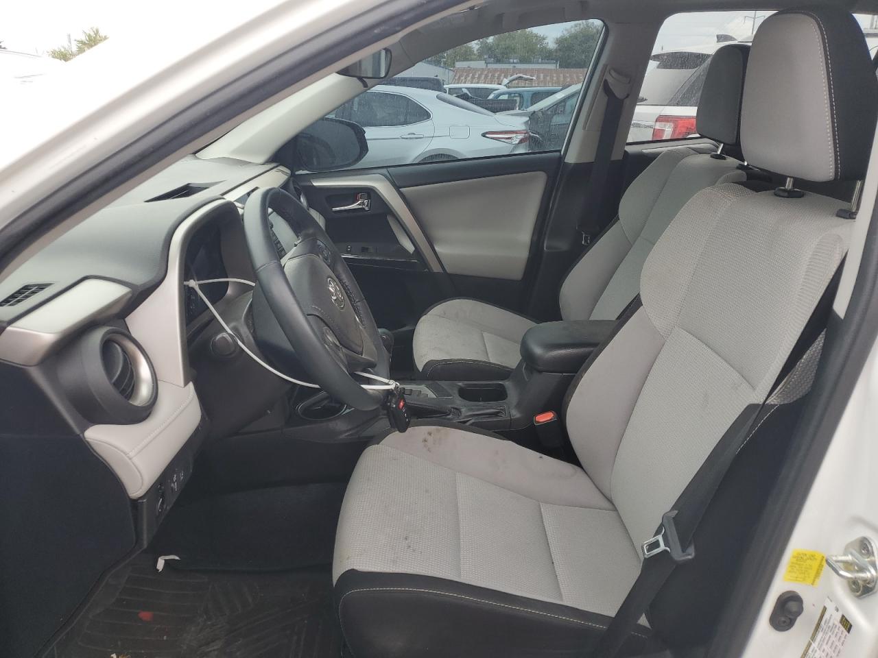2018 Toyota RAV 4 VIN 2T3RFREV2JW819958 Copart auction photo, all over damage thumbnail 7