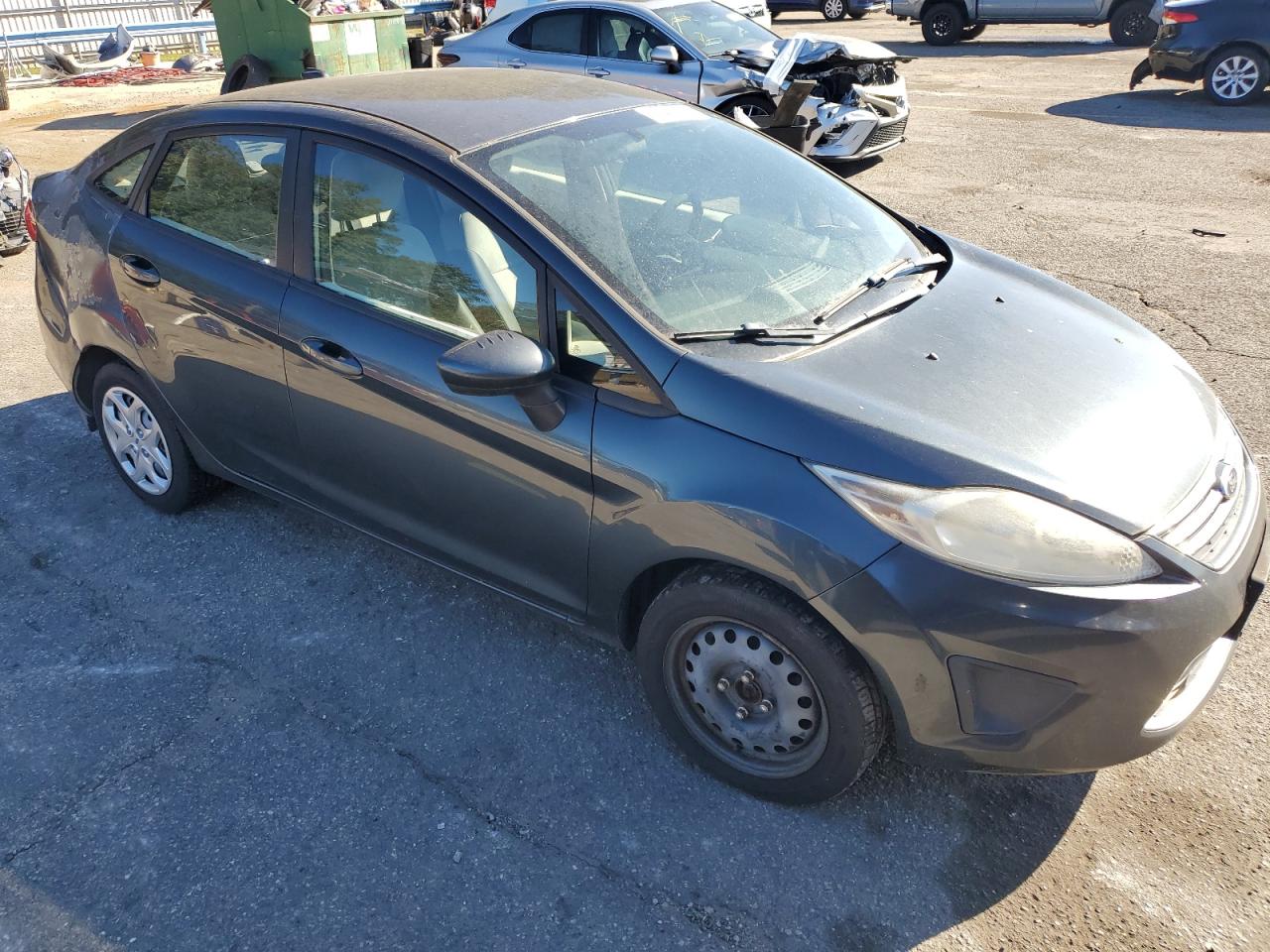 2011 Ford Fiesta VIN 3FADP4AJ4BM189642 Copart auction photo, rear end damage thumbnail 4