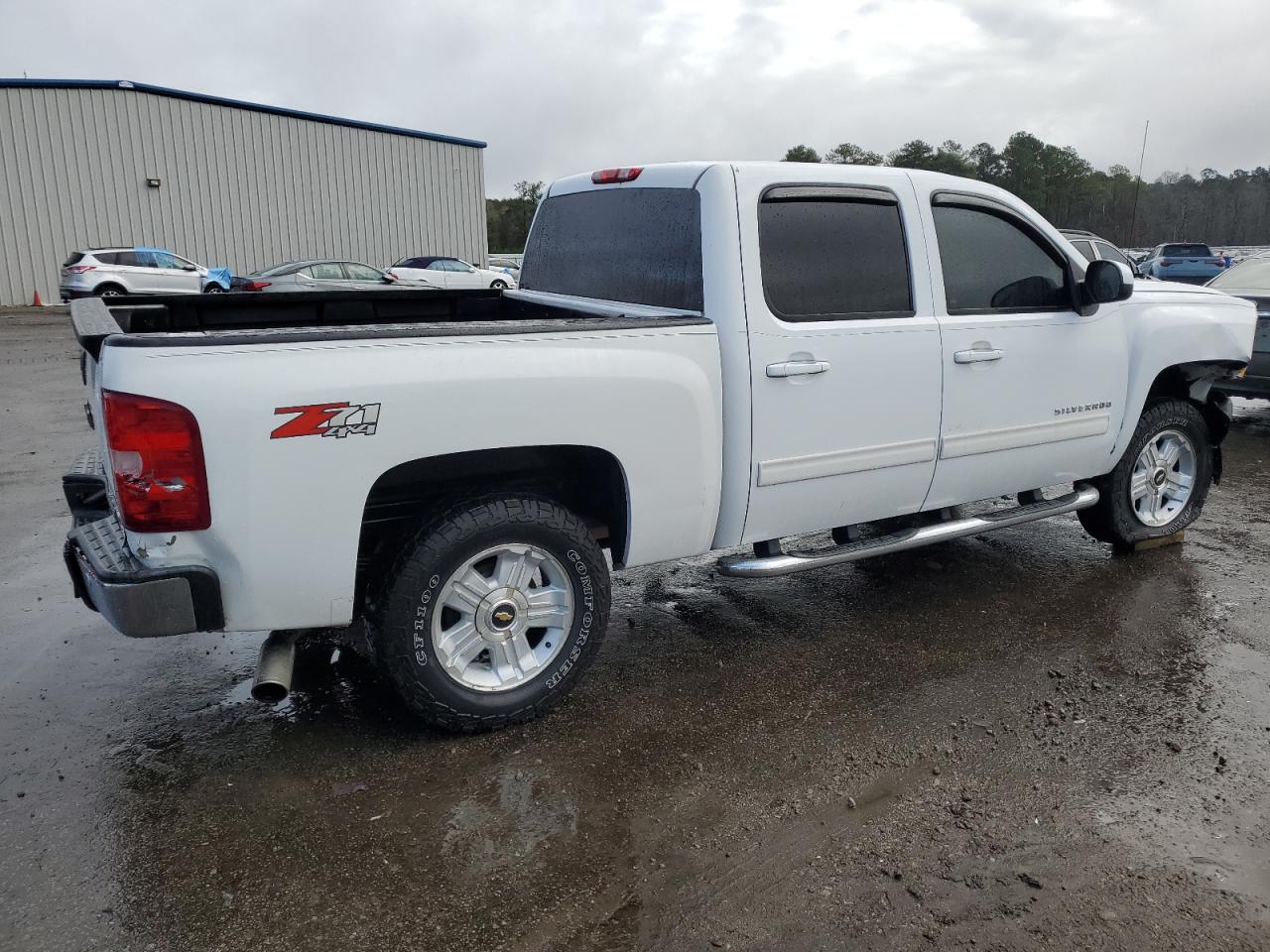 2011 Chevrolet Silverado VIN 3GCPKTE35BG233903 Copart auction photo, front end / rear end damage thumbnail 3