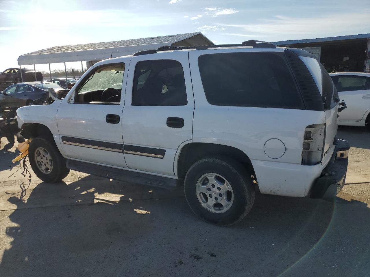 2005 Chevrolet Tahoe VIN 1GNEC13V95J228968 Copart auction photo, vandalism / stripped damage thumbnail 2