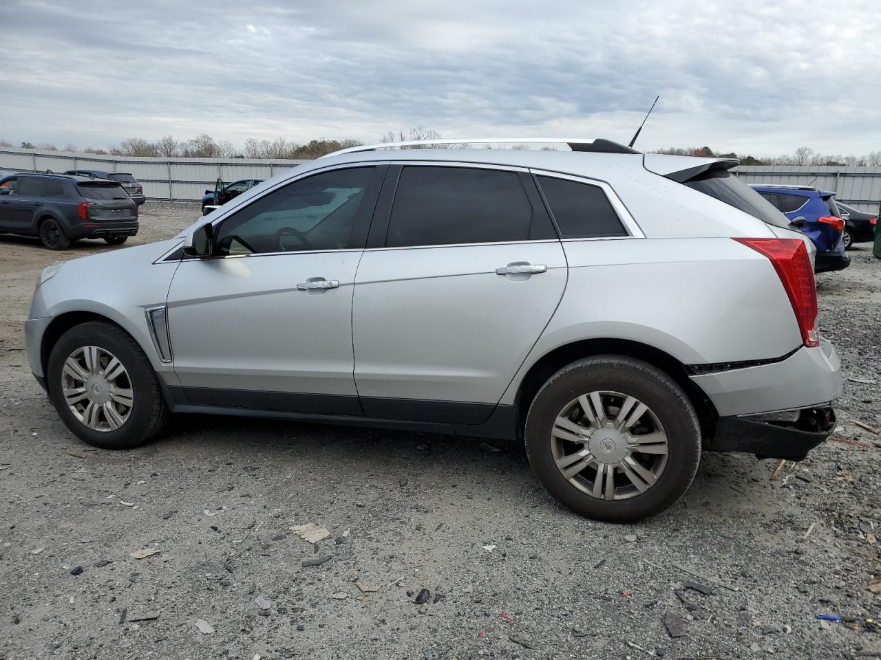 2013 Cadillac SRX VIN 3GYFNCE32DS640042 Copart auction photo, rear end / minor dent/scratches damage thumbnail 2