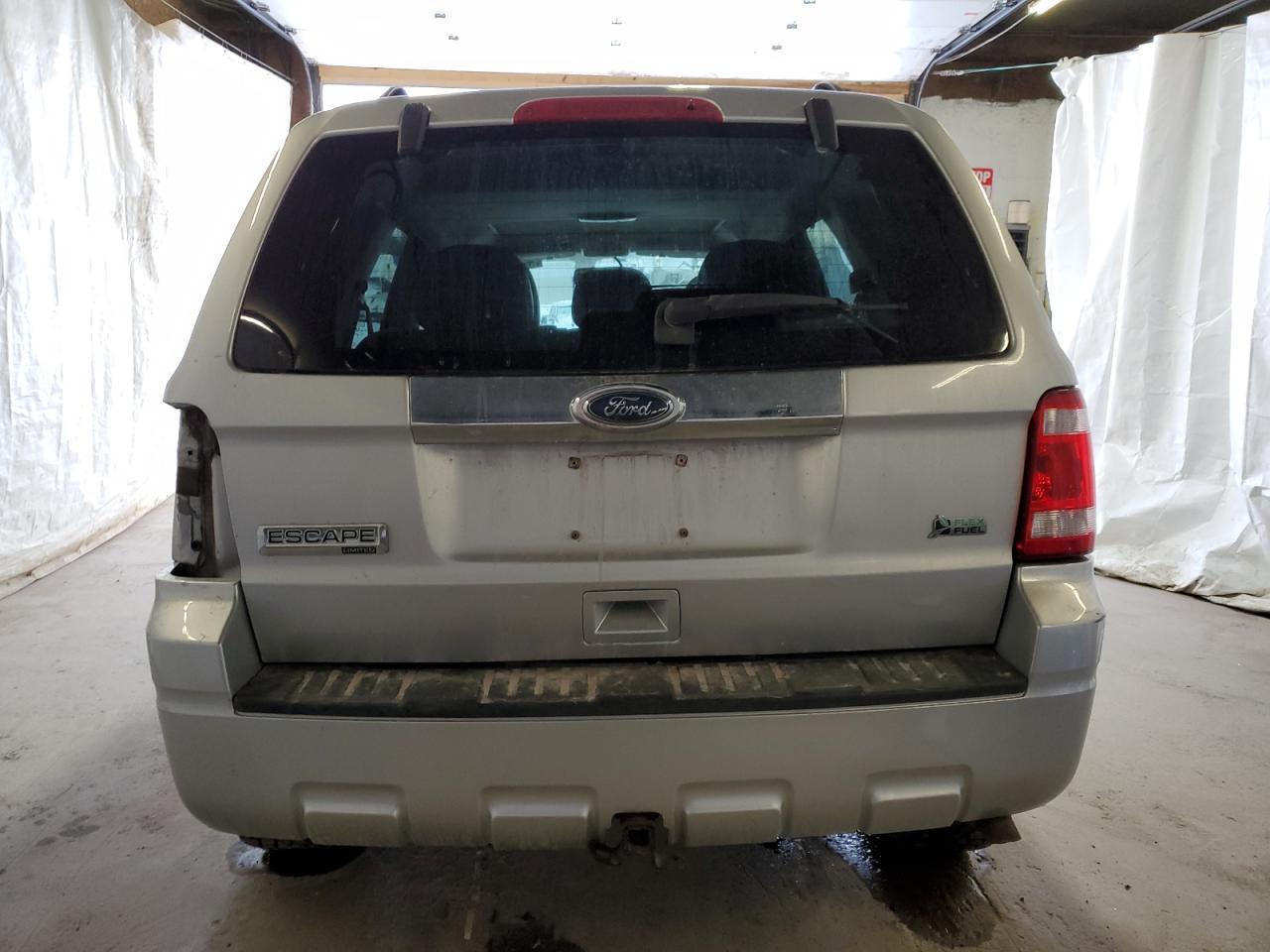 2010 Ford Escape VIN 1FMCU9EG1AKD31456 Copart auction photo, side / front end damage thumbnail 6