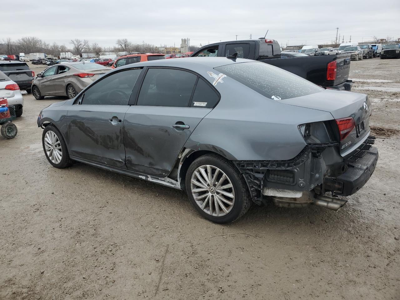 2016 Volkswagen Jetta VIN 3VWL17AJ4GM311767 Copart auction photo, all over / minor dent/scratches damage thumbnail 2
