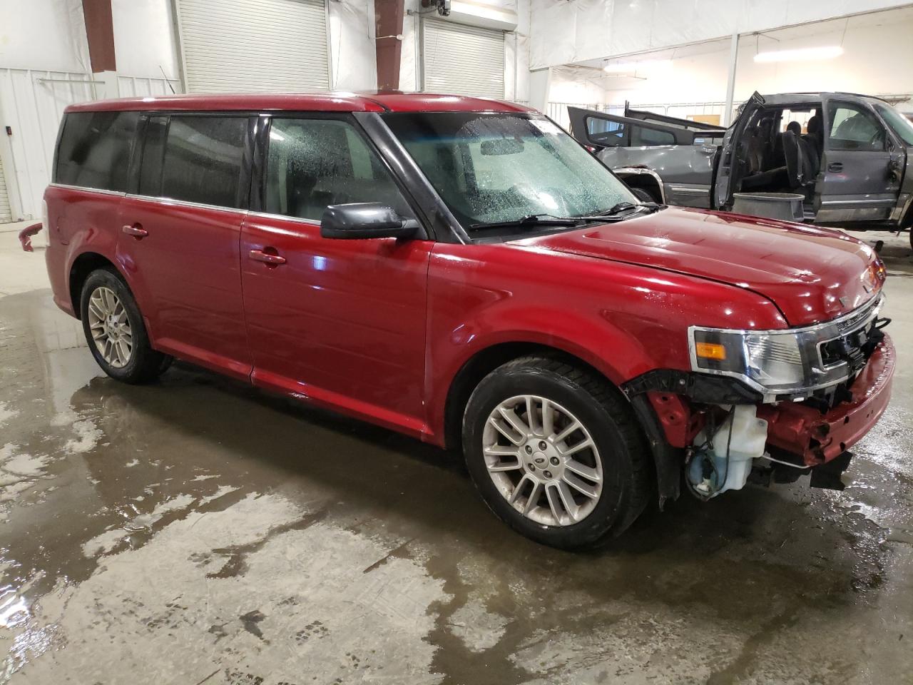 2013 Ford Flex VIN 2FMHK6C84DBD29673 Copart auction photo, front end / side damage thumbnail 4
