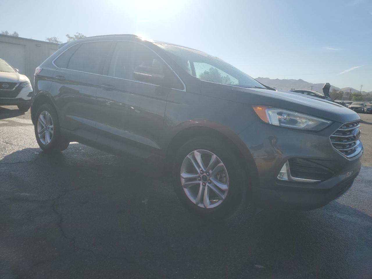 2020 Ford Edge VIN 2FMPK4J97LBA33069 Copart auction photo, side damage thumbnail 4