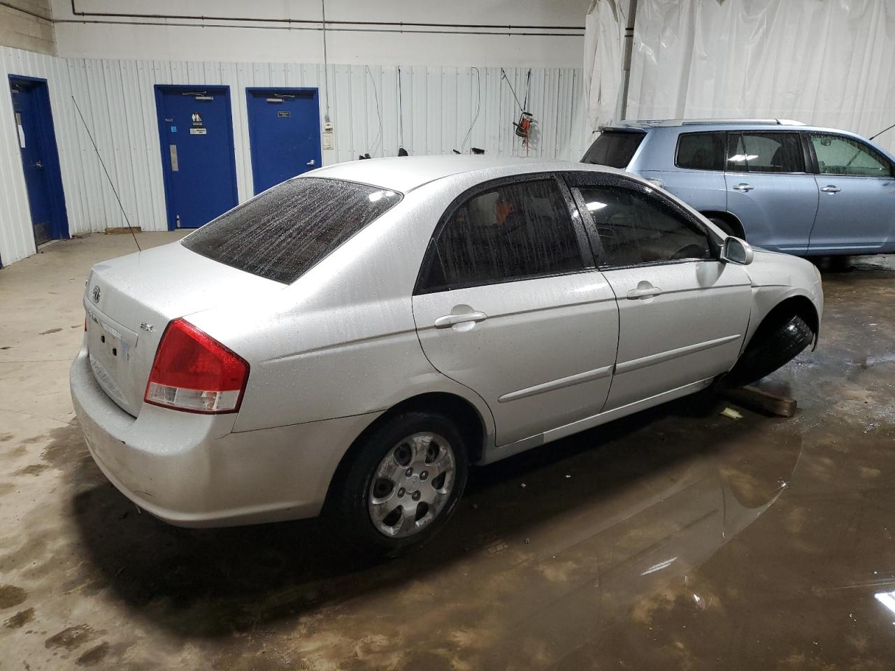 2008 KIA Spectra VIN KNAFE122585515149 Copart auction photo, side / front end damage thumbnail 3