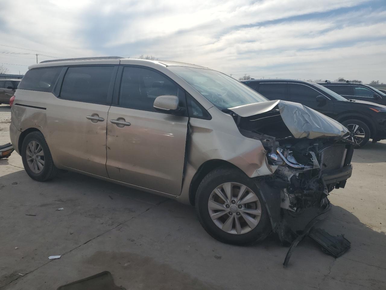 2015 KIA Sedona VIN KNDM5C1XF6040850 Copart auction photo, front end / hail damage thumbnail 4
