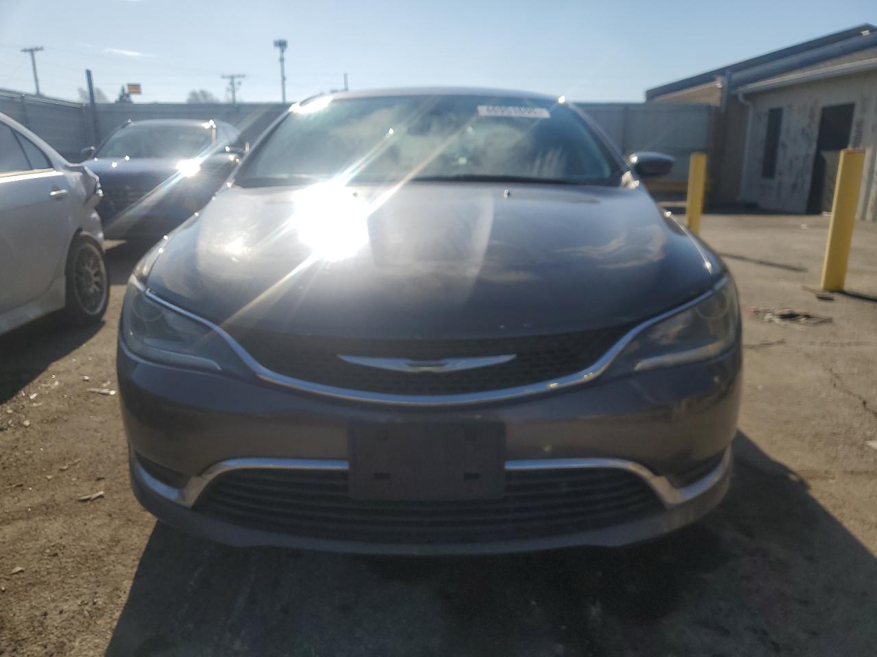 2015 Chrysler 200 VIN 1C3CCCAB8FN637885 Copart auction photo, rear end / minor dent/scratches damage thumbnail 5