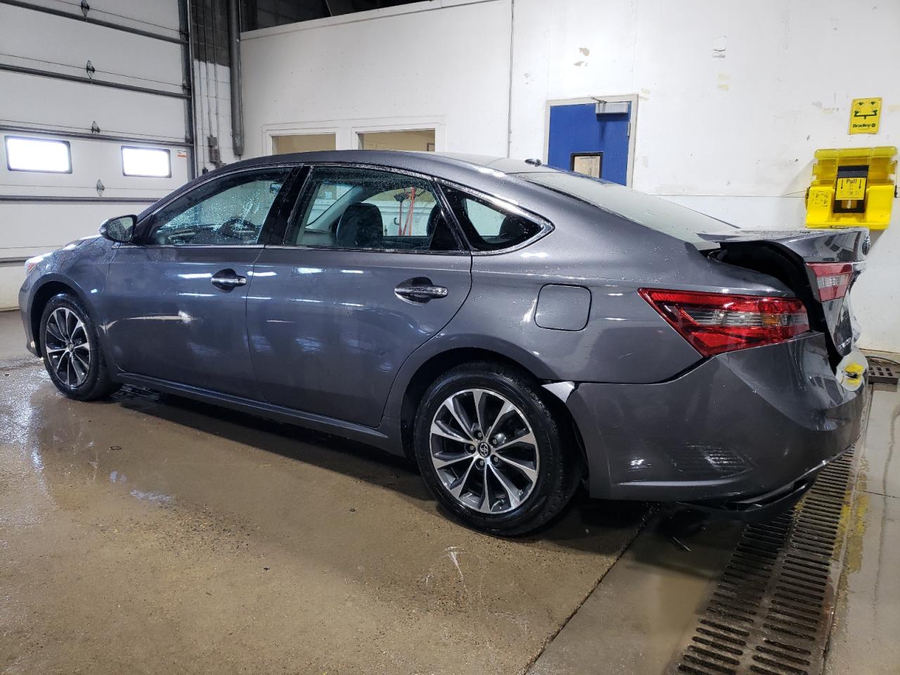 2016 Toyota Avalon VIN 4T1BK1EB0GU209935 Copart auction photo, undercarriage / rear end damage thumbnail 2