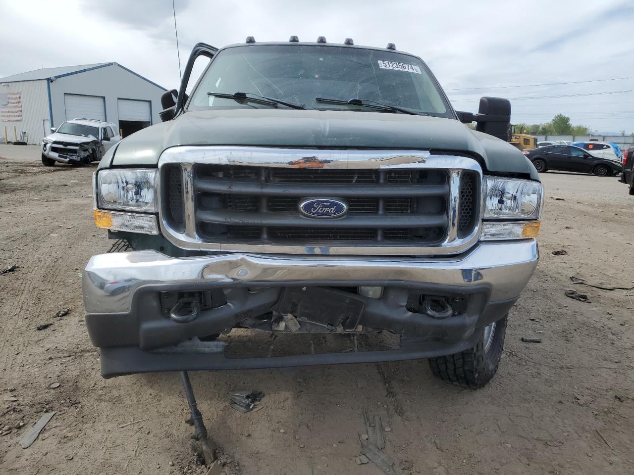 2000 Ford F250 VIN 1FTNW21F5YED04149 Copart auction photo, side / front end damage thumbnail 5