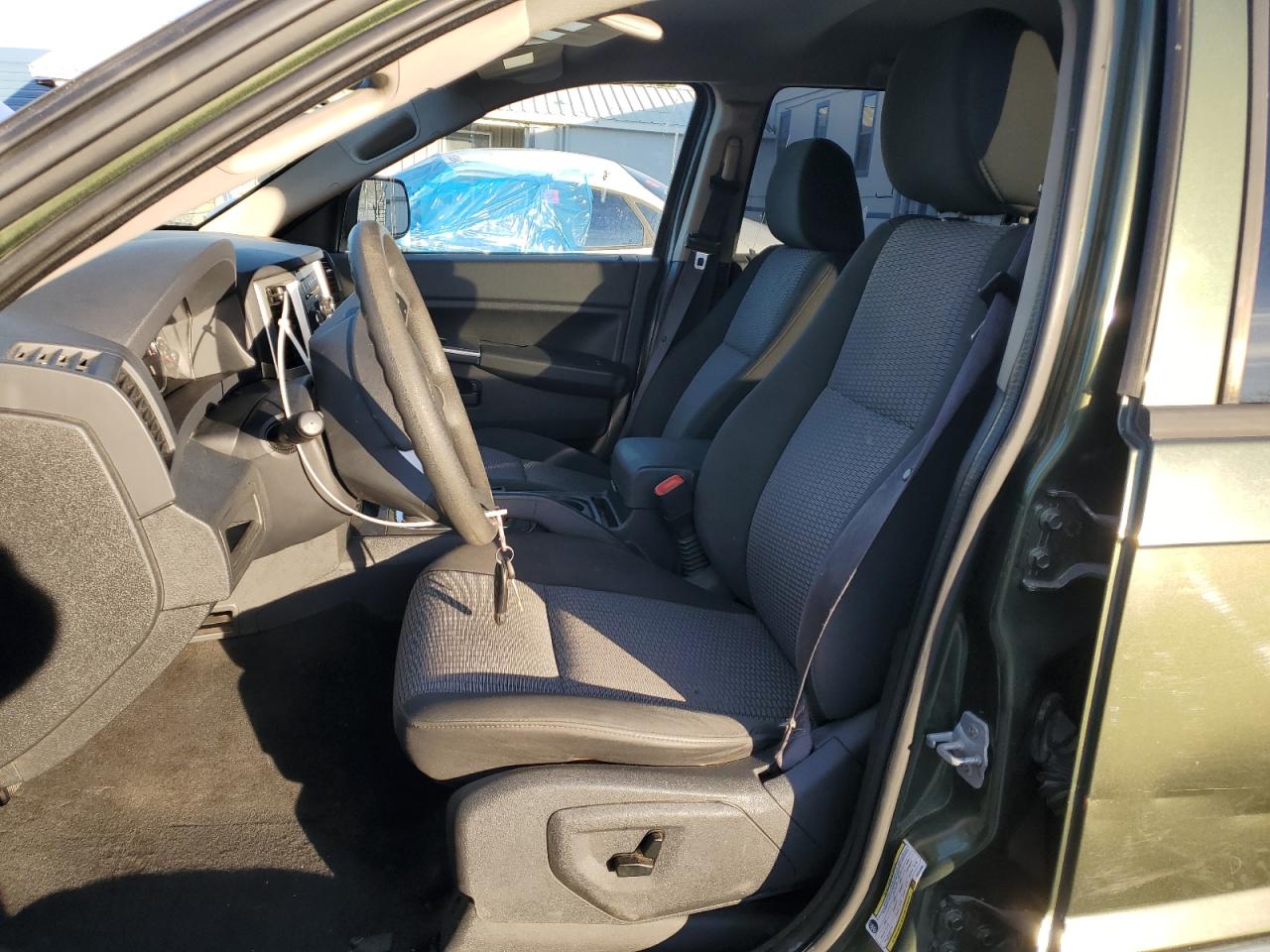2008 Jeep Grand Cherokee VIN 1J8GR48K58C221050 Copart auction photo, side / rear end damage thumbnail 7