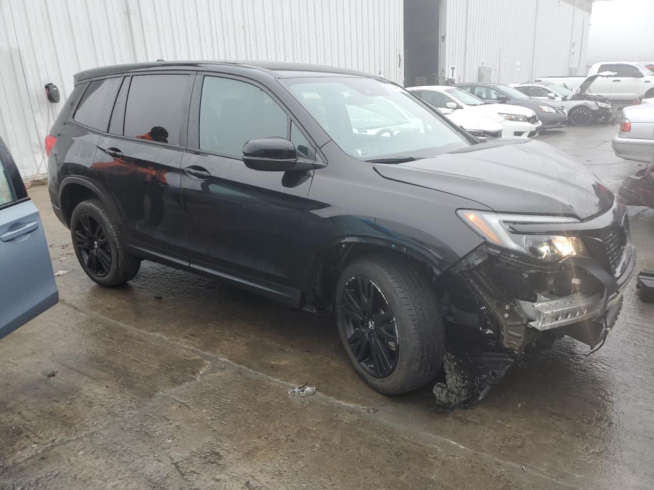 2021 Honda Passport VIN 5FNYF8H24MB032186 Copart auction photo, front end / minor dent/scratches damage thumbnail 4
