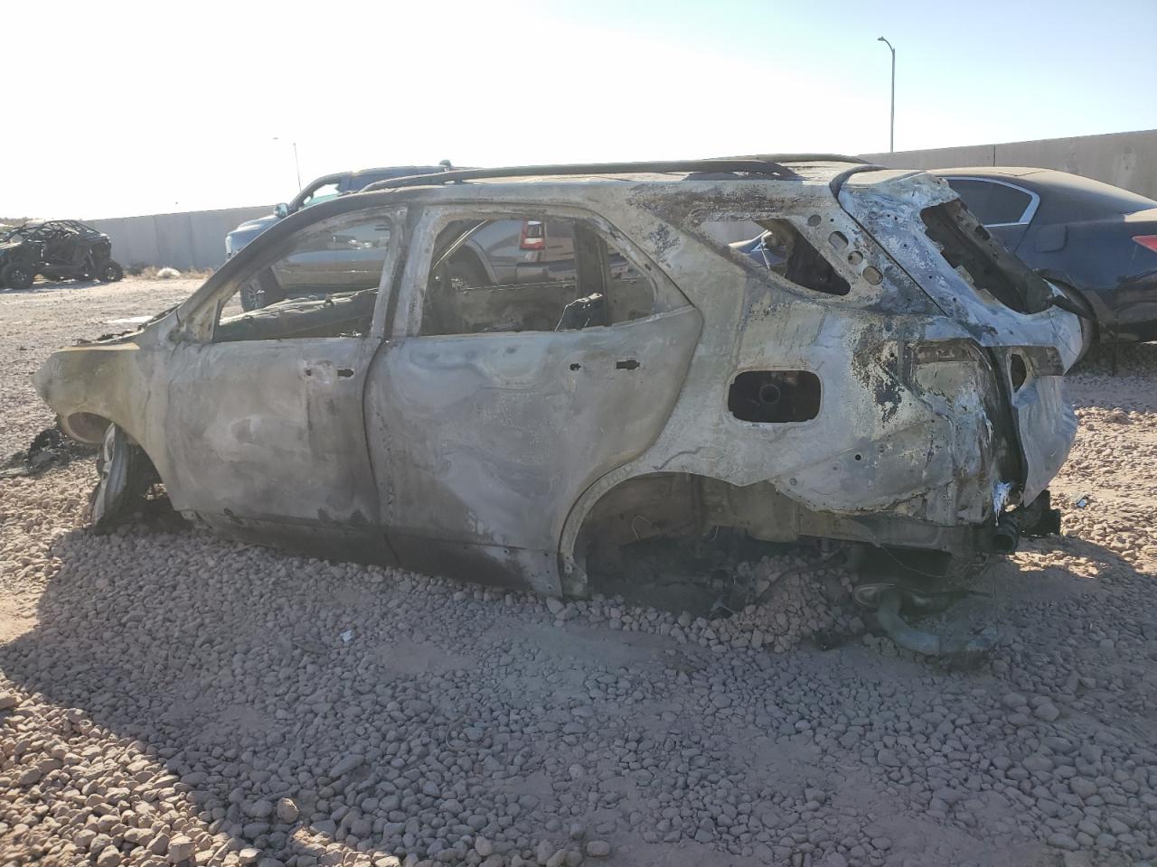 2018 Chevrolet Equinox VIN 2GNAXNEX2J6193058 Copart auction photo, burn damage thumbnail 2