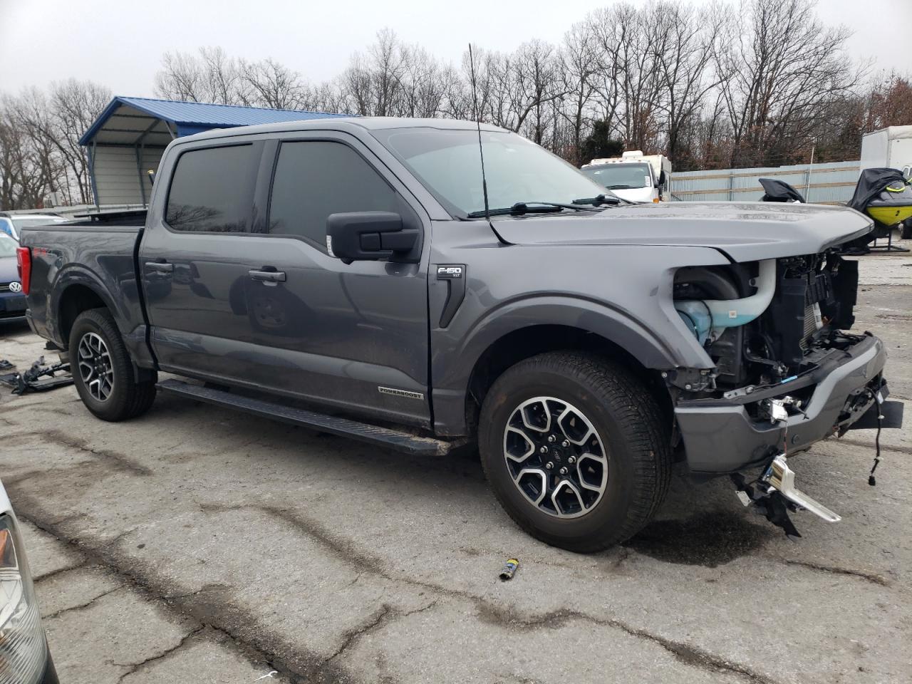 2023 Ford F-150 VIN 1FTFW1ED0PFB31138 Copart auction photo, front end / hail damage thumbnail 4