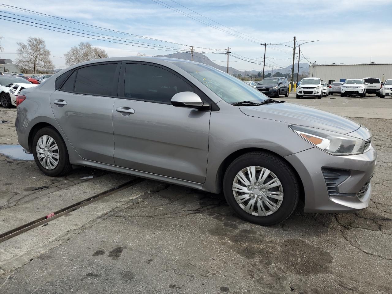 2021 KIA Rio VIN 3KPA24AD3ME364398 Copart auction photo, side damage thumbnail 4