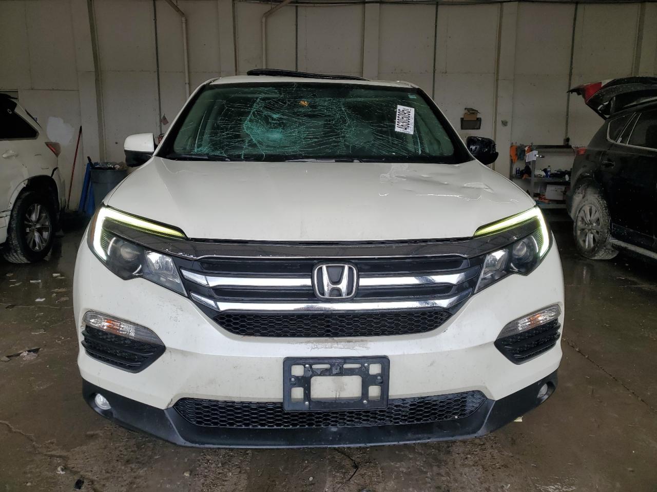 2016 Honda Pilot VIN 5FNYF5H52GB047119 Copart auction photo, all over damage thumbnail 5