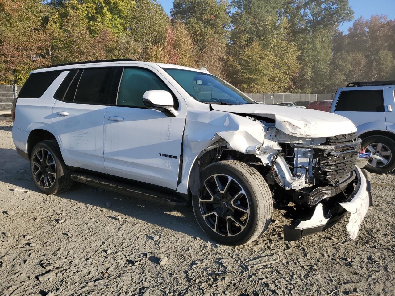 2022 Chevrolet Tahoe VIN 1GNSKRKD8NR273690 Copart auction photo, front end / side damage thumbnail 4