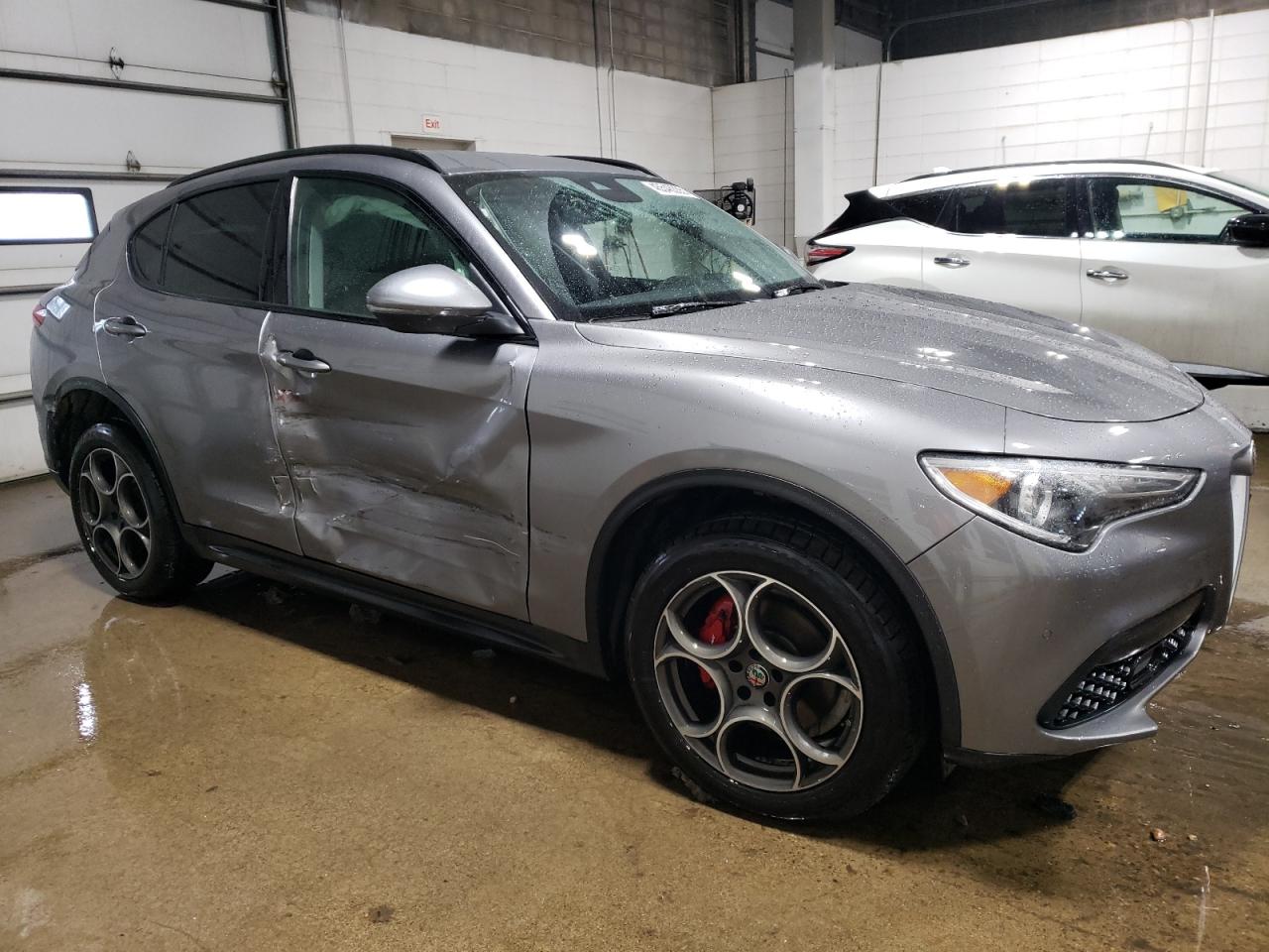 2018 Alfa Romeo Stelvio VIN ZASFAKPN1J7B89911 Copart auction photo, all over damage thumbnail 4