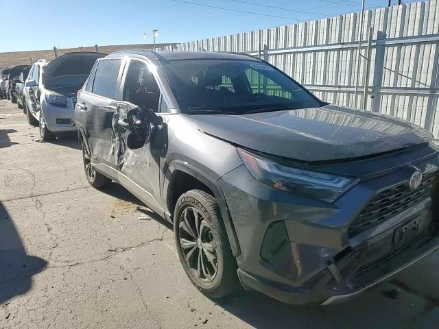 2023 Toyota RAV 4 VIN JTM16RFV8PJ028966 Copart auction photo, side / front end damage thumbnail 12