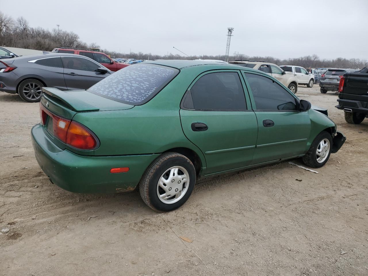 1996 Mazda Protege VIN JM1BB1418T0330159 Copart auction photo, front end / minor dent/scratches damage thumbnail 3