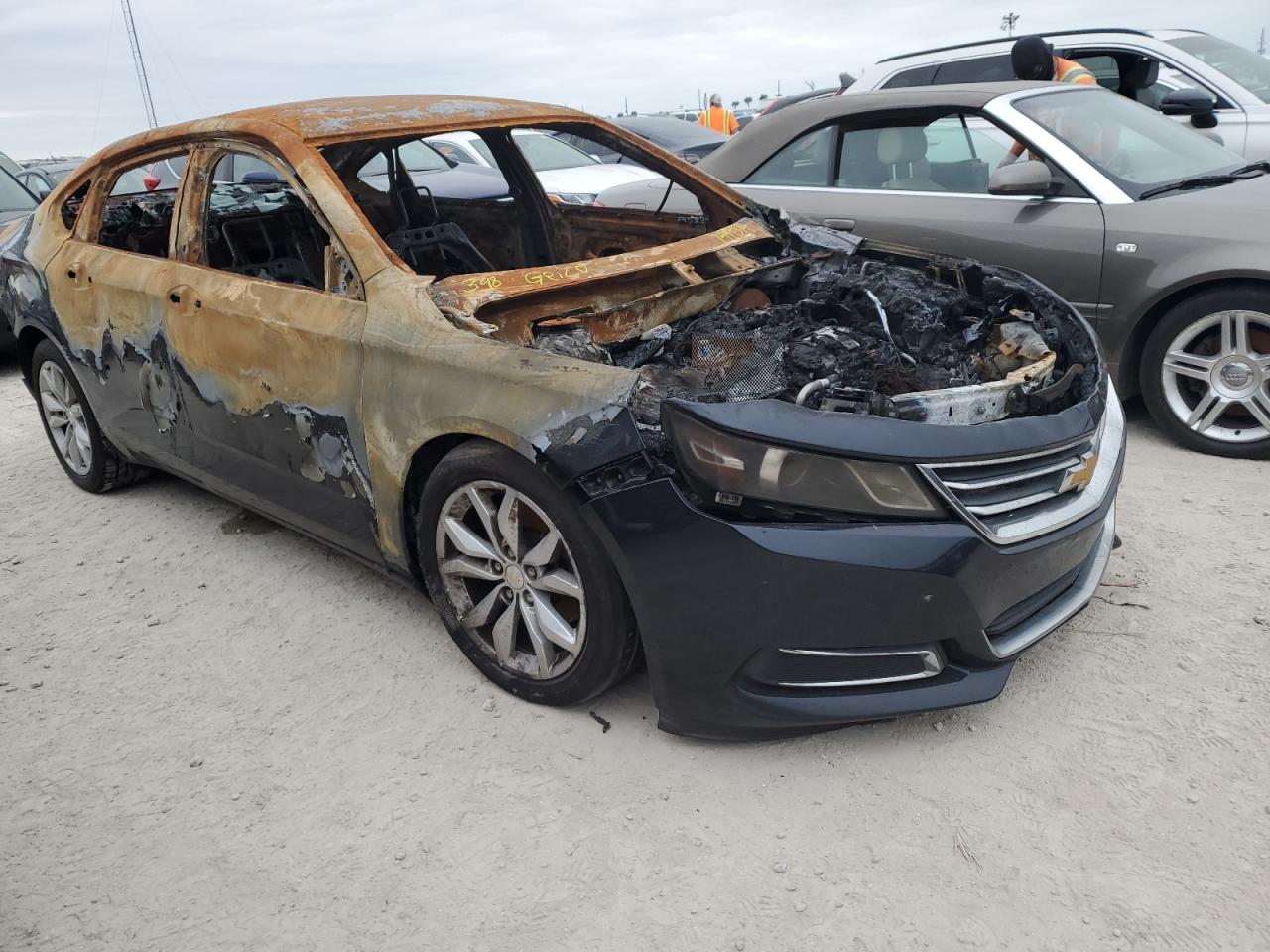 2017 Chevrolet Impala VIN 2G1105S37H9109414 Copart auction photo, burn damage thumbnail 4