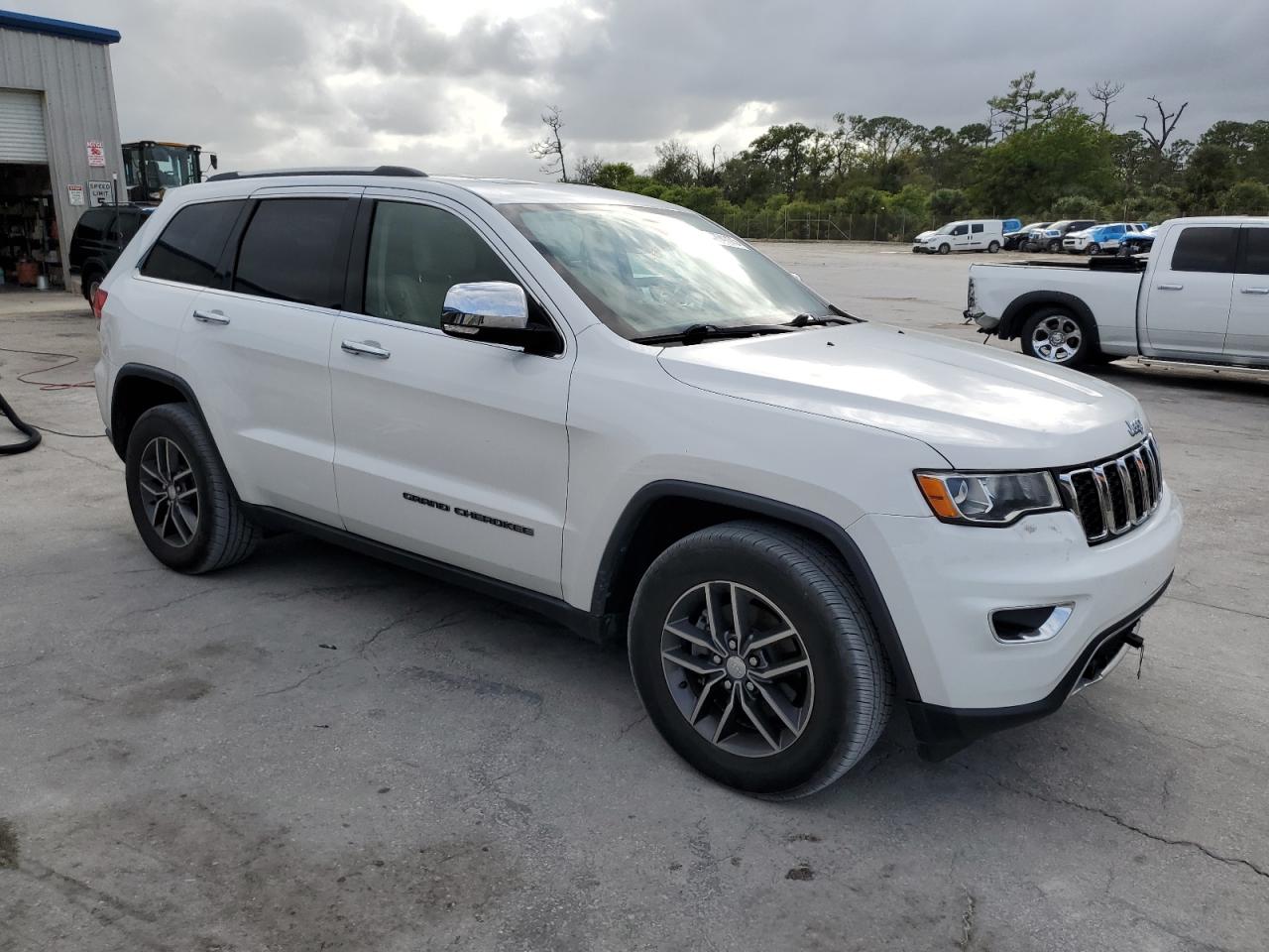 2017 Jeep Grand Cherokee VIN 1C4RJFBG0HC803127 Copart auction photo, rear end / minor dent/scratches damage thumbnail 4