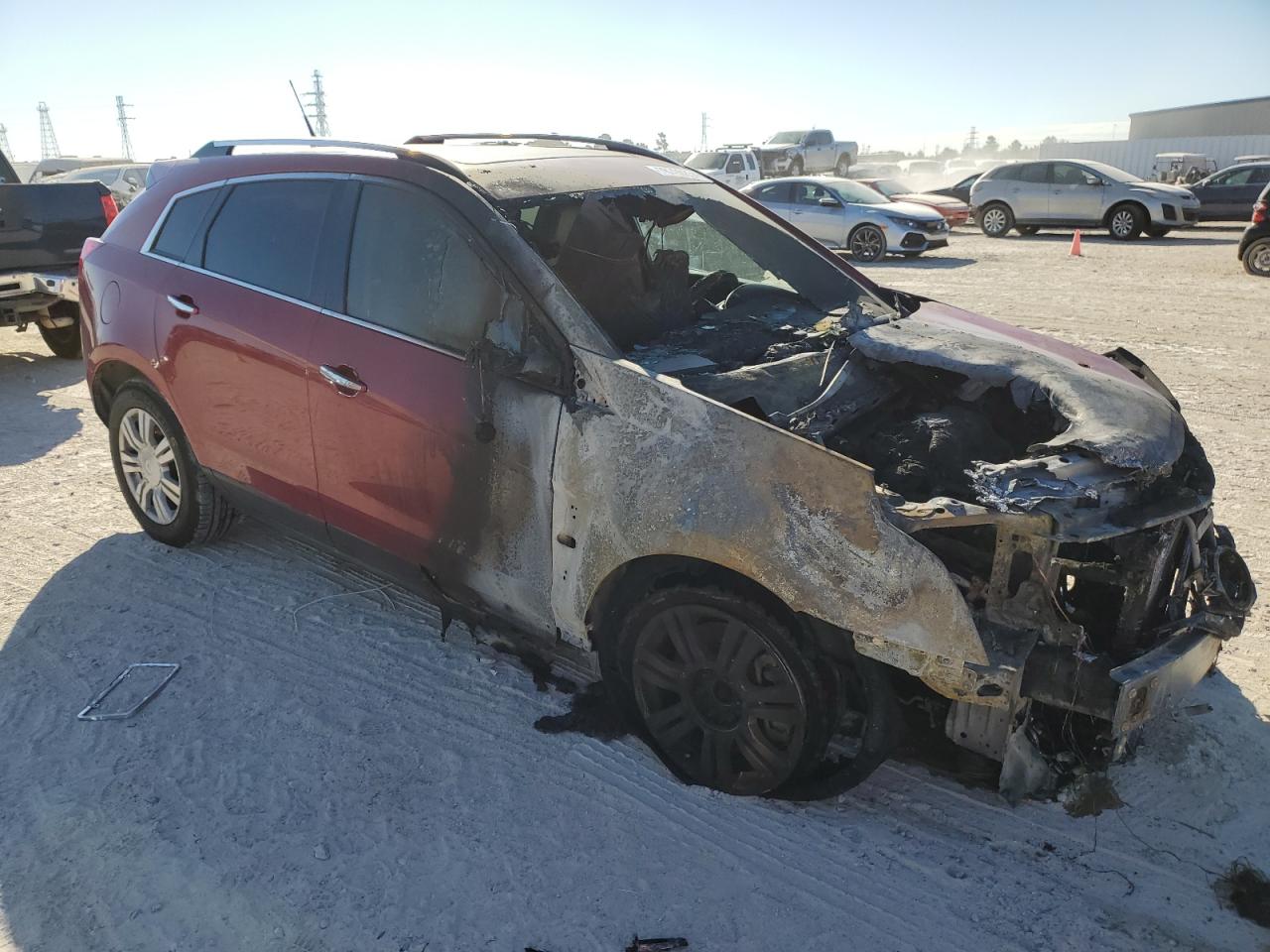 2013 Cadillac SRX VIN 3GYFNGE37DS644689 Copart auction photo, burn damage thumbnail 4