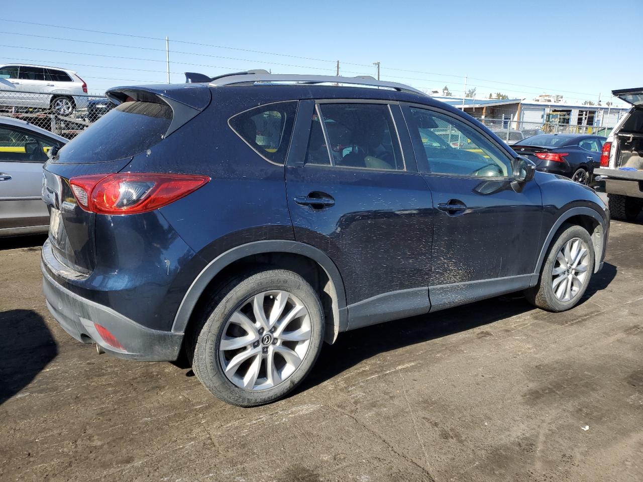 2015 Mazda CX-5 VIN JM3KE4DY3F0553517 Copart auction photo, front end / hail damage thumbnail 3