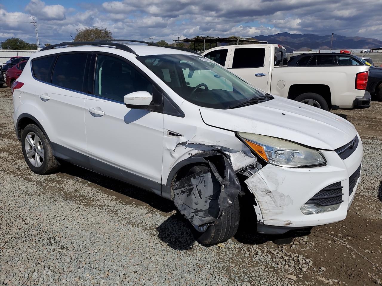 2015 Ford Escape VIN 1FMCU0GX7FUB07273 Copart auction photo, front end / rear end damage thumbnail 4