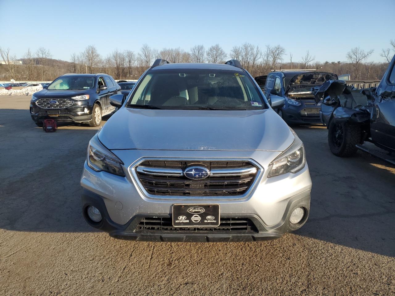 2018 Subaru Outback VIN 4S4BSANC8J3231395 Copart auction photo, rear end / minor dent/scratches damage thumbnail 5