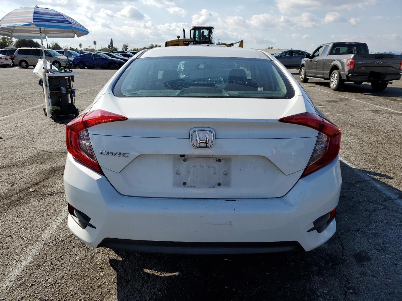 2016 Honda Civic VIN 2HGFC2F77GH555715 Copart auction photo, side / minor dent/scratches damage thumbnail 6