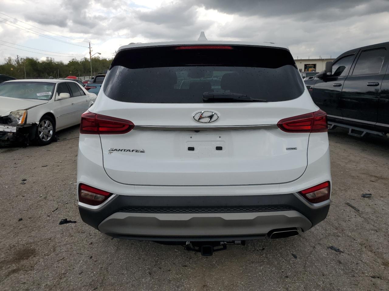 2020 Hyundai Santa Fe VIN 5NMS3CAD2LH189340 Copart auction photo, front end / minor dent/scratches damage thumbnail 6