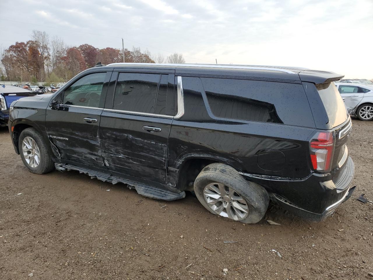 2021 Chevrolet Suburban VIN 1GNSKFKD8MR358770 Copart auction photo, side / rear end damage thumbnail 2
