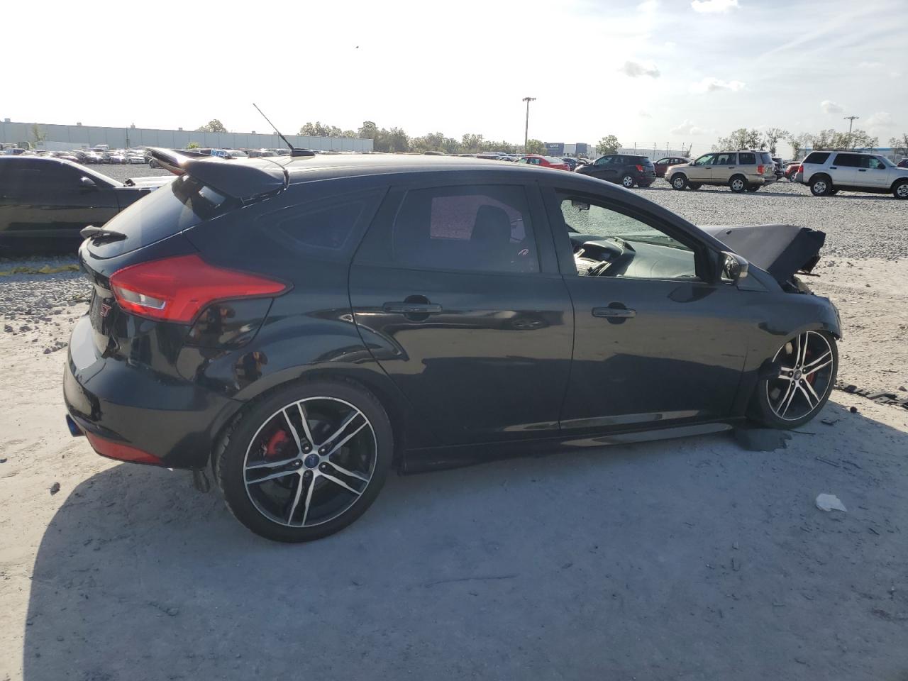 2016 Ford Focus VIN 1FADP3L9XGL211004 Copart auction photo, front end / minor dent/scratches damage thumbnail 3