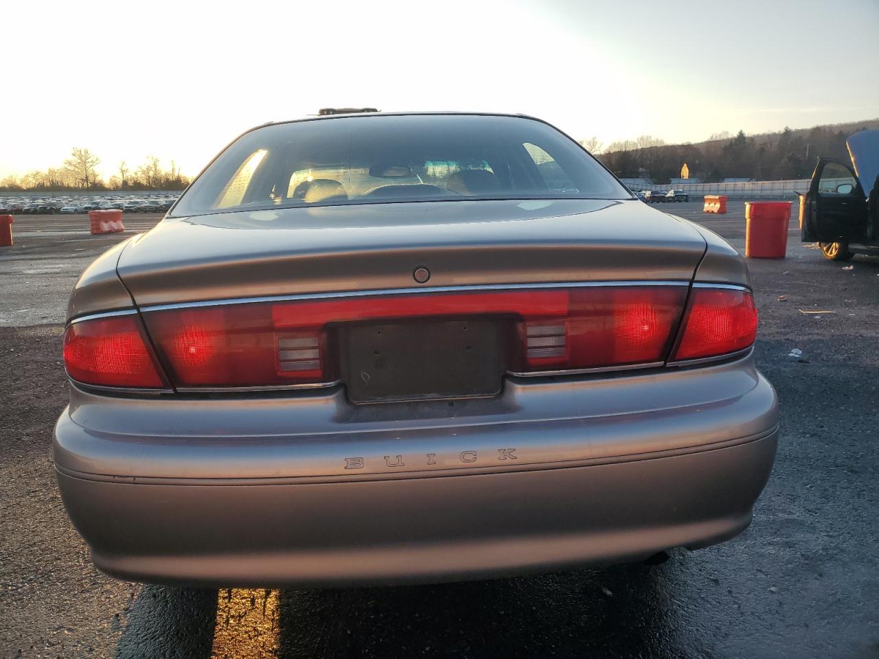 2000 Buick Century VIN 2G4WY55J4Y1156751 Copart auction photo, front end / minor dent/scratches damage thumbnail 6
