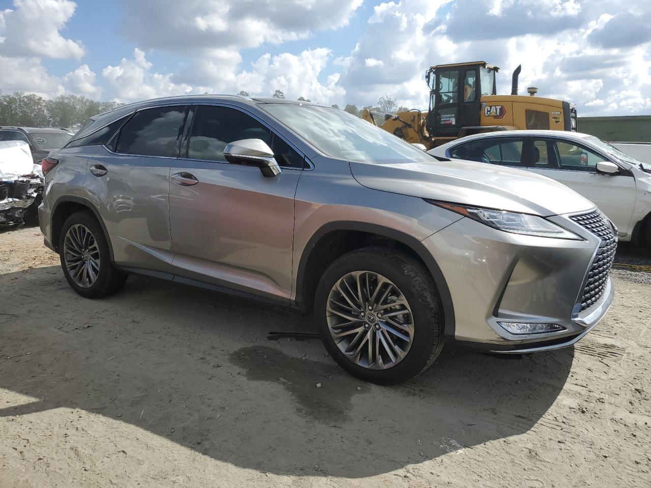 2020 Lexus RX VIN 2T2JZMAA3LC167550 Copart auction photo, side / minor dent/scratches damage thumbnail 4
