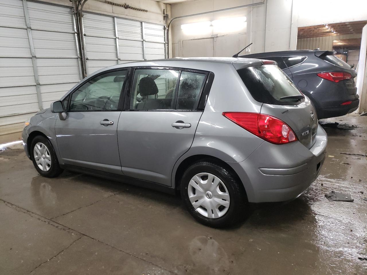 2012 Nissan Versa VIN 3N1BC1CP9CK803176 Copart auction photo, side / undercarriage damage thumbnail 2