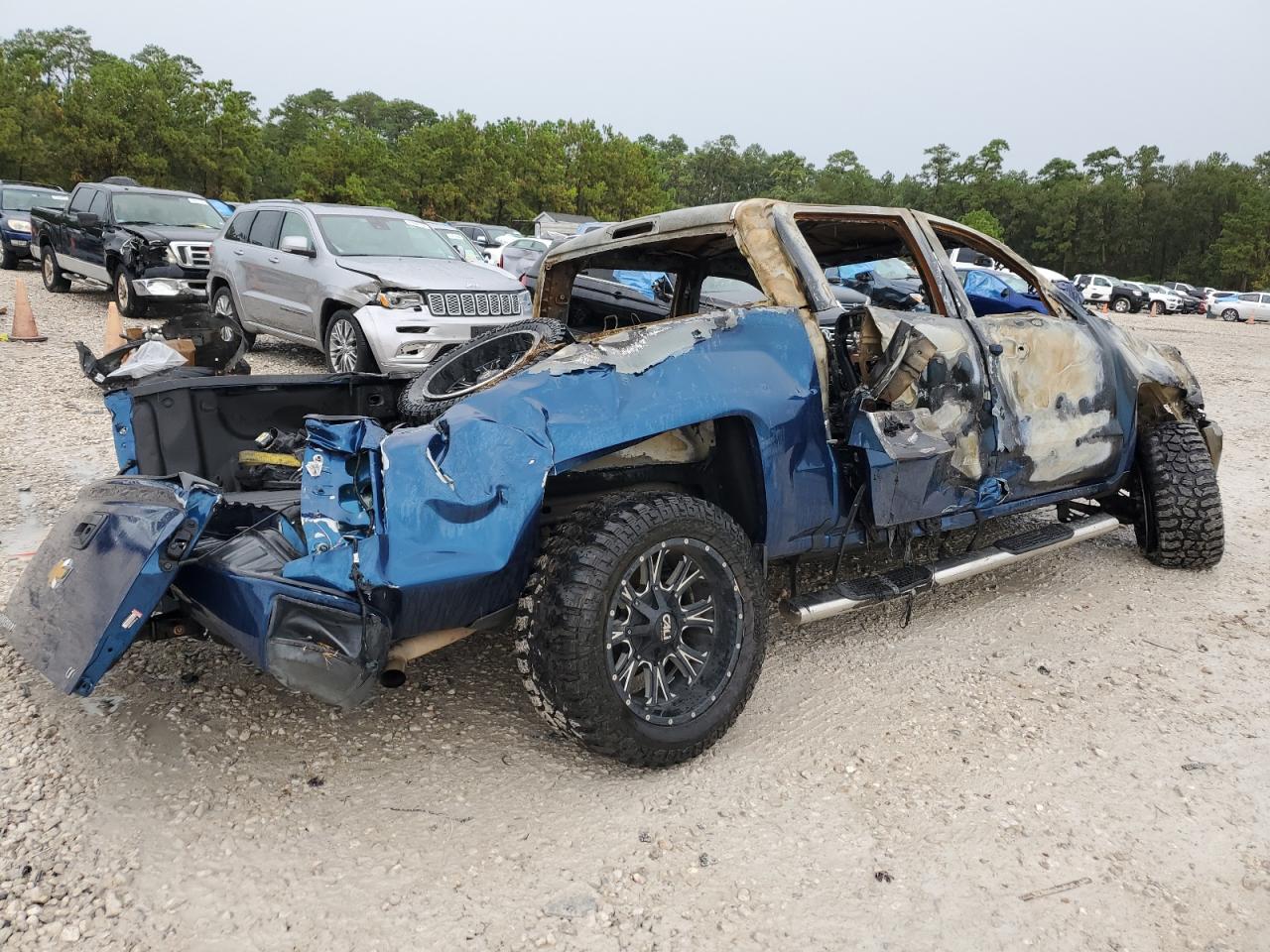 2018 Chevrolet Silverado VIN 3GCUKREC4JG183838 Copart auction photo, burn damage thumbnail 3