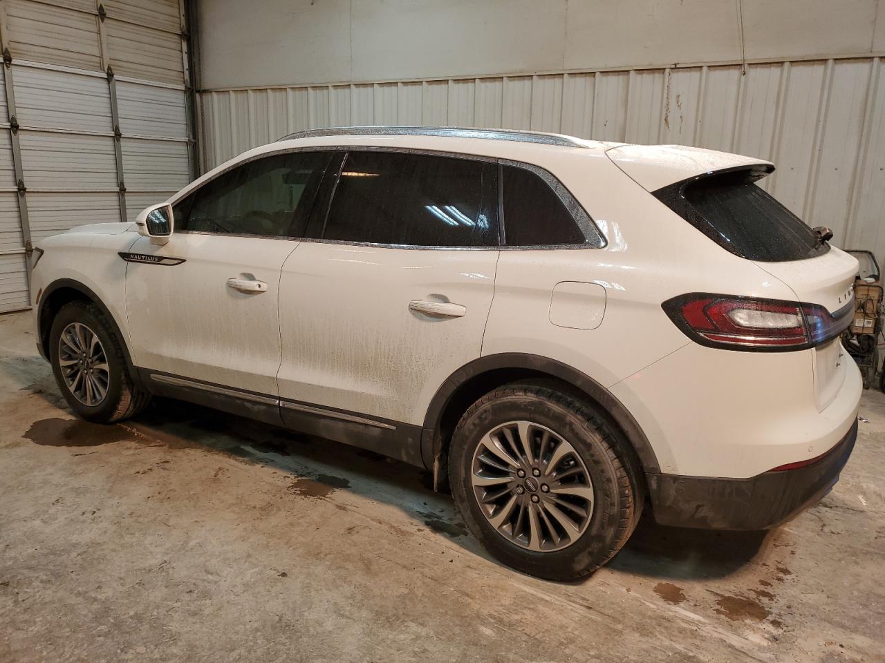2022 Lincoln Nautilus VIN 2LMPJ6J90NBL08495 Copart auction photo, hail / minor dent/scratches damage thumbnail 2
