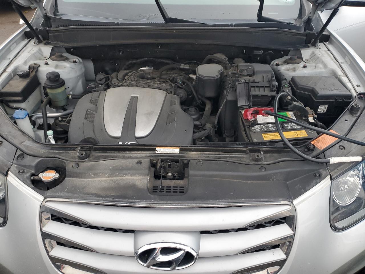 2012 Hyundai Santa Fe VIN 5XYZKDAG9CG130555 Copart auction photo, side damage thumbnail 12